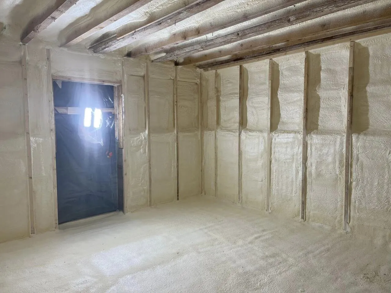 Foamed wall cavities in a residential renovation